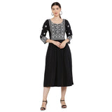 Black rayon printed kurti with 3/4th sleeves on a fashion mannequin