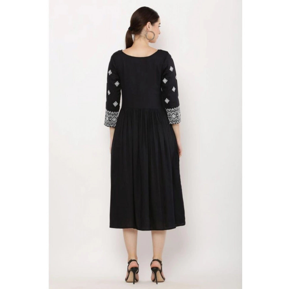 Black rayon printed kurti with 3/4th sleeves on mannequin
