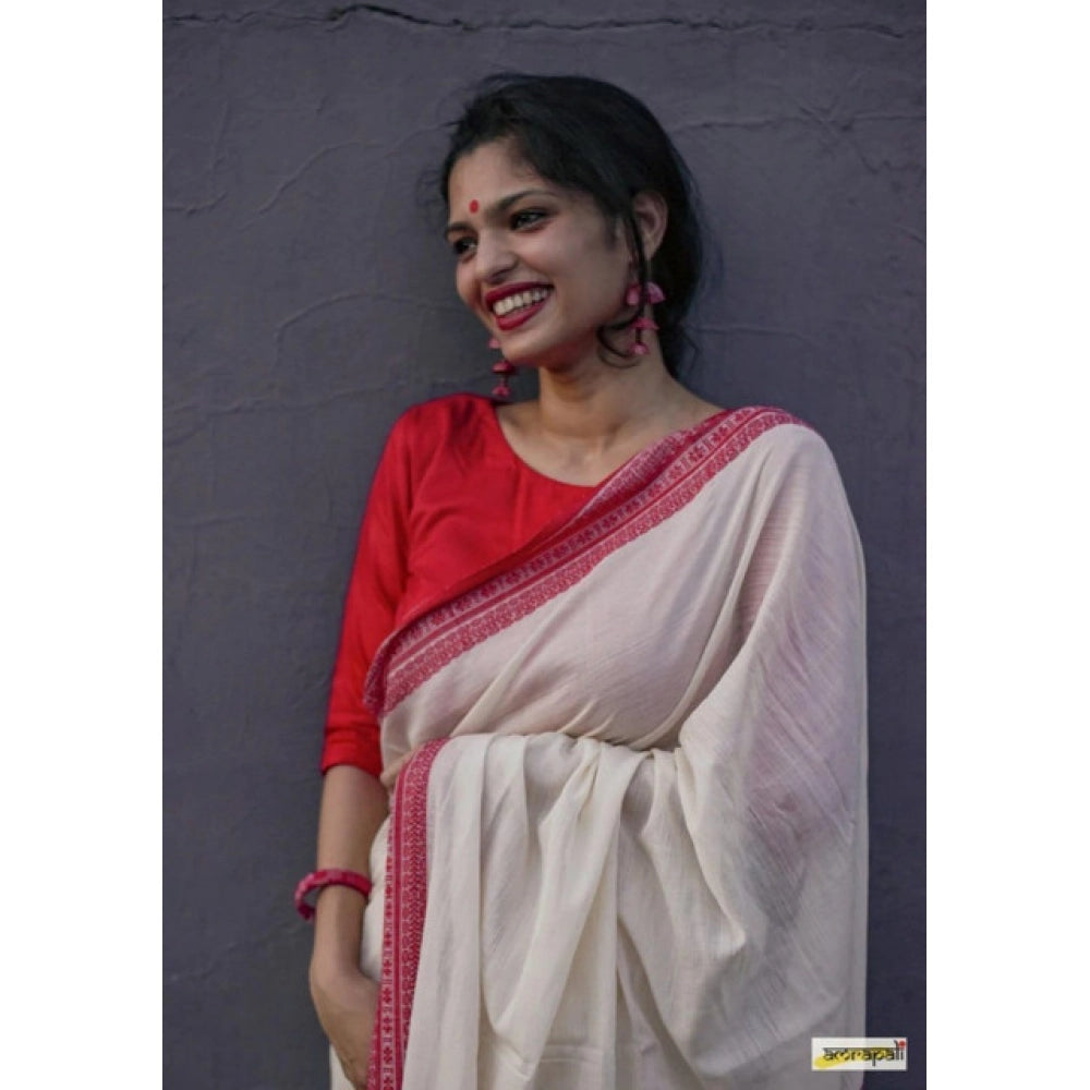 White soft lilan printed saree with unstitched blouse, vibrant design on display
