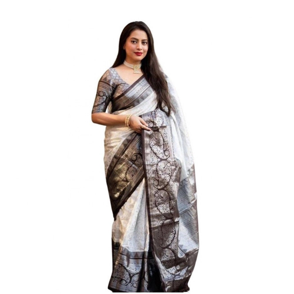 Off-white soft lichi silk printed saree with unstitched blouse, luxury ethnic wear for women on display
