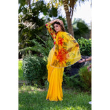 Yellow georgette printed saree with unstitched blouse, vibrant Indian women's wear on mannequin
