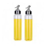 Multi-colored plastic oil bottles with airtight dispensers, ideal for kitchen essentials