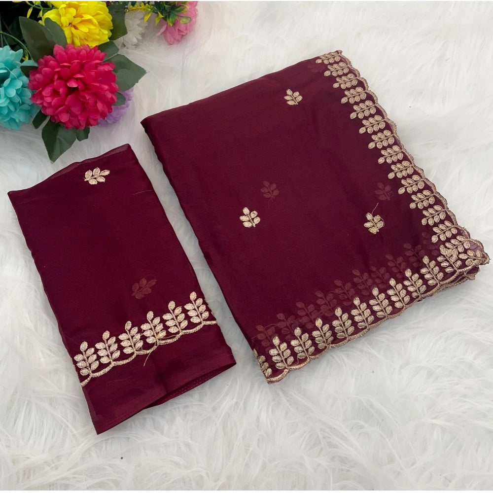 Red Georgette embroidered saree with unstitched blouse (5.5Mtr), traditional Indian bridal wear on display