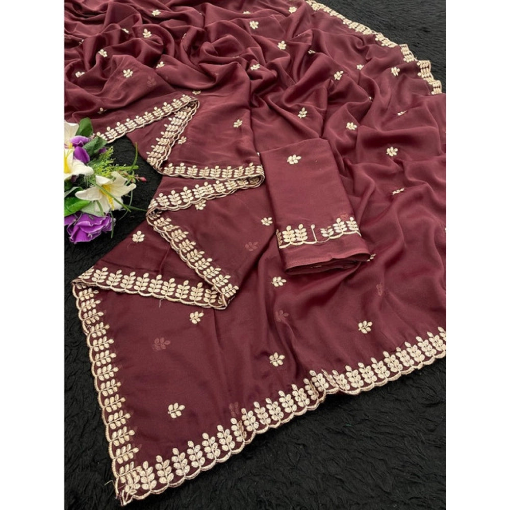 Maroon georgette embroidered saree with unstitched blouse, intricate design on display