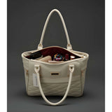 Cream PU Leather handbag with 4 compartments, polyester lining, adjustable strap, and zipper closure