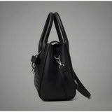 Black PU Leather Solid Handbag, dual handle, adjustable strap, zipper closure, polyester lining