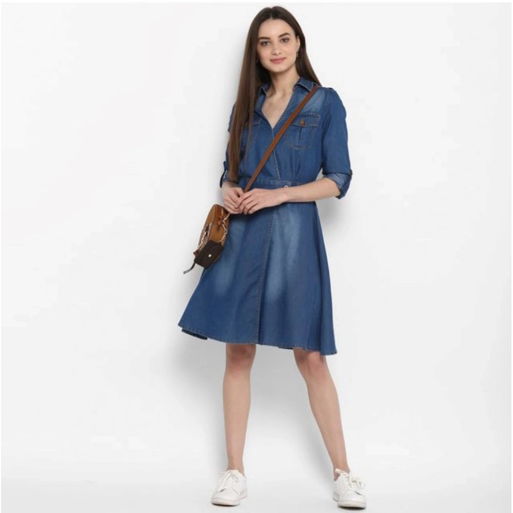 Blue denim roll-up sleeve dress with shirt collar neck and button closure, solid pattern for women's casual wear on display