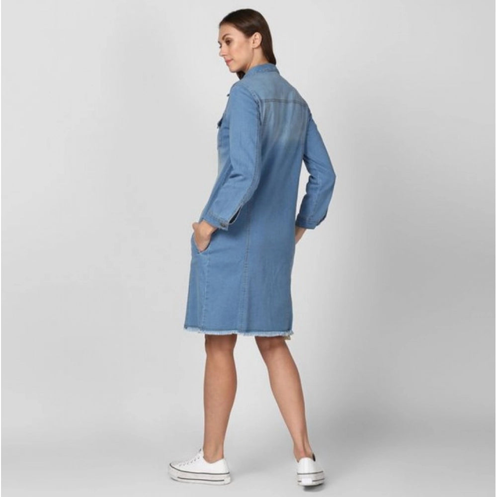 Blue denim washed long sleeves jacket with spread collar neck and button closure on model, women's jacket fashion accessory