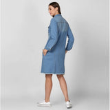 Blue denim washed long sleeves jacket with spread collar neck and button closure on model, women's jacket fashion accessory