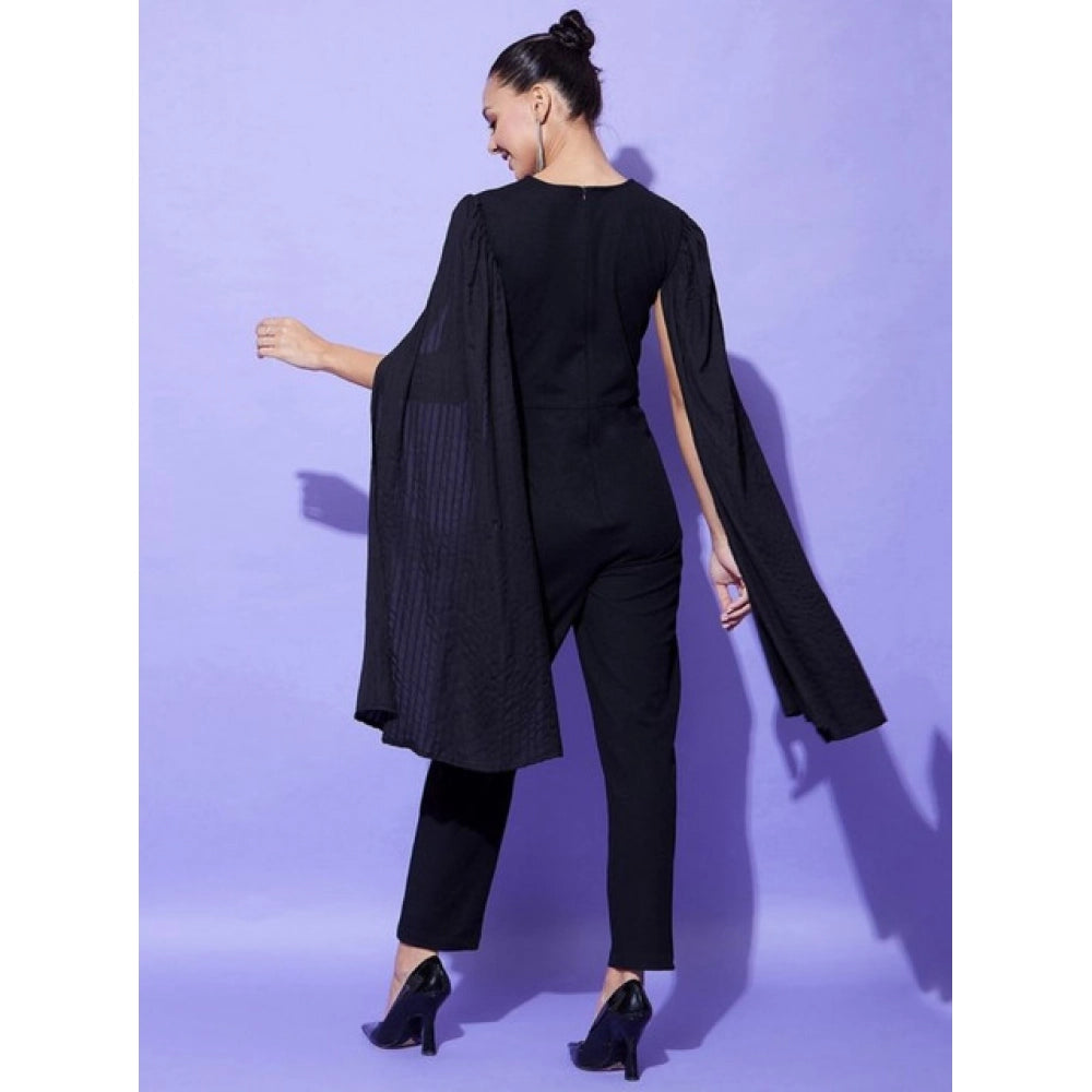 Black polyester solid cape sleeve jumpsuit on woman, concealed zip closure and pant bottom style