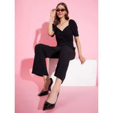 Black polyester lycra women's puff sleeve jumpsuit with sweatheart neck and ankle length