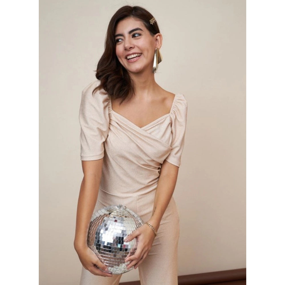 Gold polyester shimmer self-design short sleeve jumpsuit with a sweatheart neck and ankle length, on model