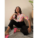 Multicolor polyester floral half sleeves women's jumpsuit with shirt collar neck and button closure, ankle length bottom type pant on display stand