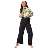 Multicolor polyester floral half-sleeve jumpsuit with shirt collar neck and ankle length, features button closure and pant bottom style