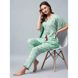 Green-Pink rayon floral kaftan night suit on model, V-neck, ankle length with slip-on closure