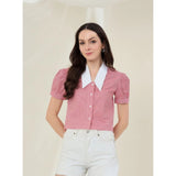Red-white cotton checkered half sleeve shirt for women on a hanger