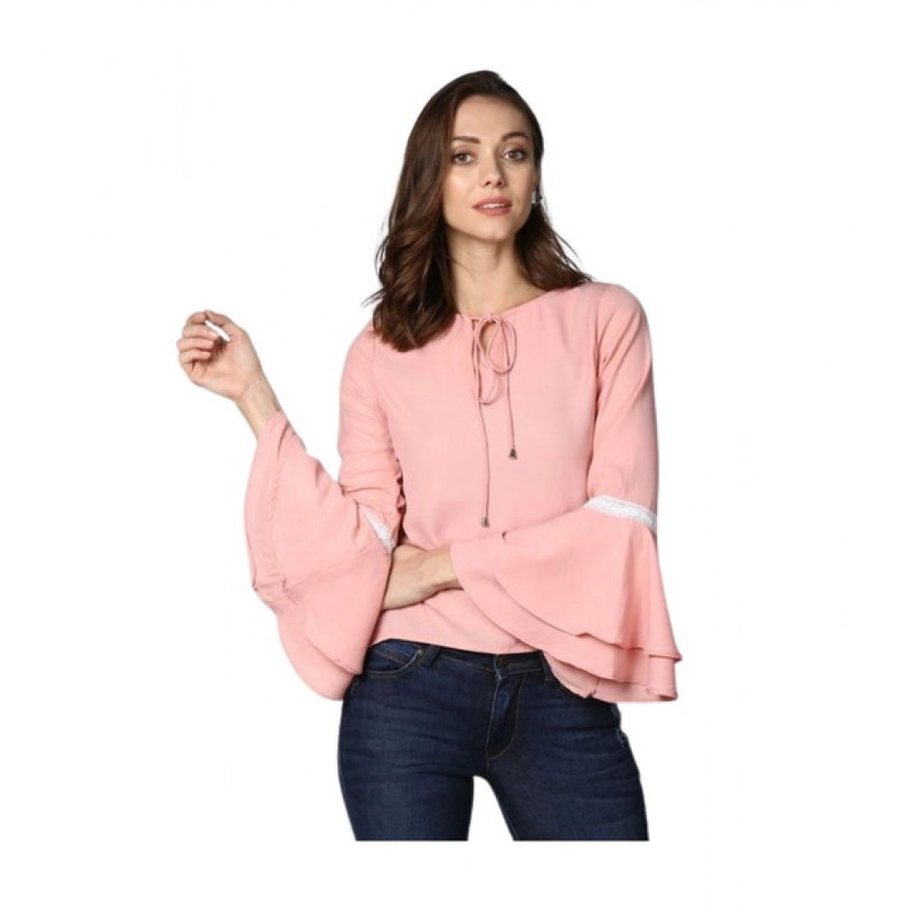 Pink polyester solid bell sleeve top for women, hip length with round neck and pull-on closure