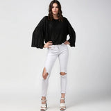 Black polyester pleated balloon sleeve top for women on model