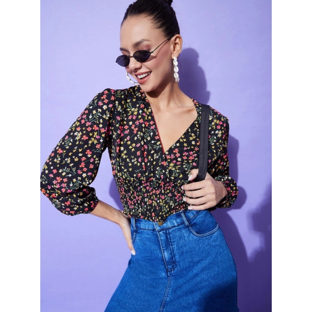 Multicolor polyester floral long-sleeved top with V-neck on women's mannequin