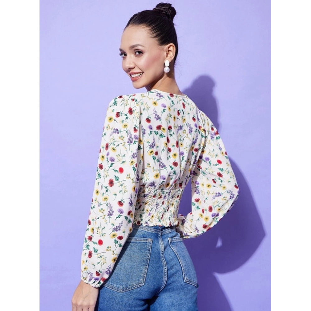 Women's multicolor polyester floral long sleeves V-neck top with hip length, vibrant floral pattern visible