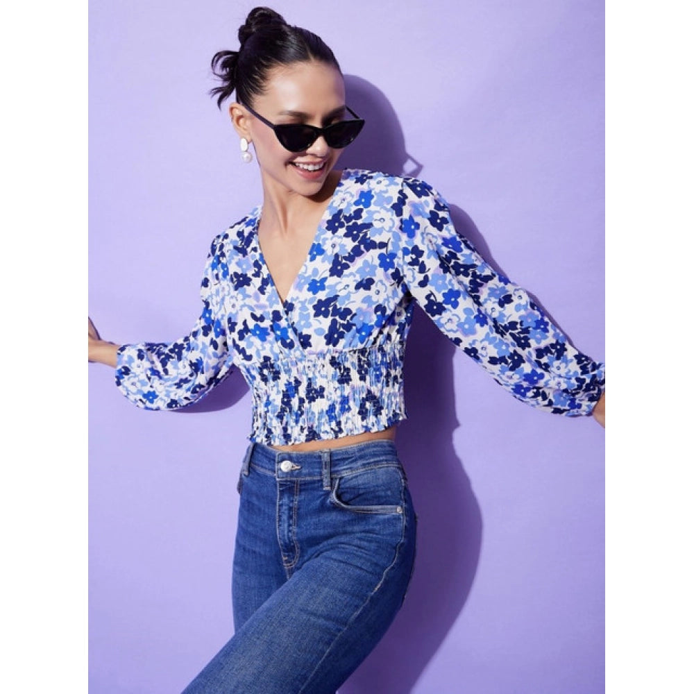 Blue polyester floral long sleeve top with V-neck, ideal for women's casual wear