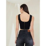 Black denim lycra sleeveless top with square neck, waist length, and zip closure for women's fashion