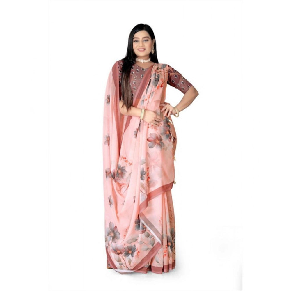 Peach georgette floral printed saree with unstitched blouse, 5.5Mtr on mannequin