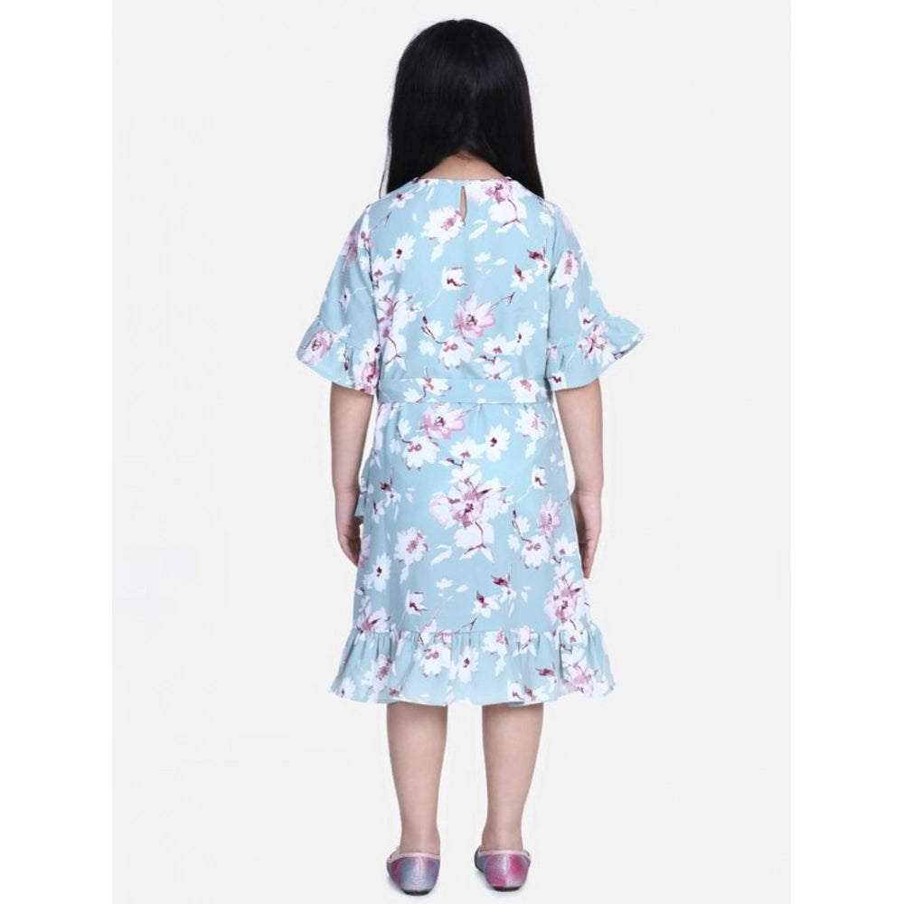 Turquoise blue polyester crepe floral bell sleeve dress for girls, round neck, below knee length on mannequin