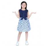 Blue denim polka sleeveless dress with round neck and button closure on mannequin