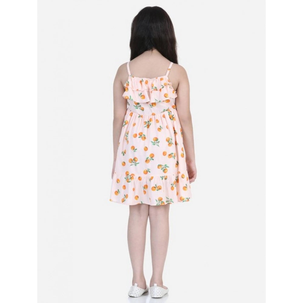 Orange rayon printed sleeveless dress for girls, vibrant pattern on casual summer outfit
