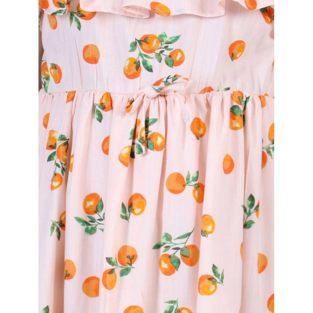 Orange rayon printed sleeveless dress for girls, vibrant floral pattern on a casual summer outfit