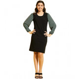 Green-Black Polyester Lycra printed sleeveless dress for girls, vibrant design on display