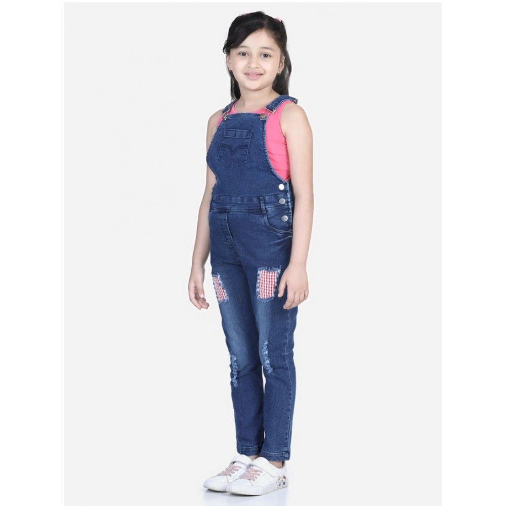 Blue denim patchwork dungaree for girls, buttoned waist and round neck, pull-on closure