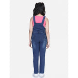 Blue denim patch work buttoned dungaree for girls, casual wear on mannequin