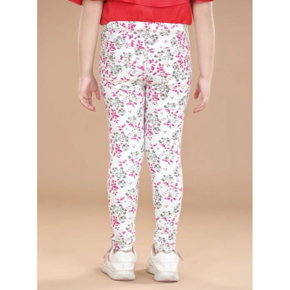 White-Pink cotton lycra floral elasticated jeggings for girls, featuring a vibrant floral pattern on stretchy fabric