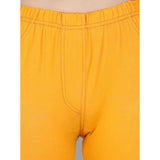 Mustard cotton lycra elasticated jeggings for girls, solid pattern with comfortable fit