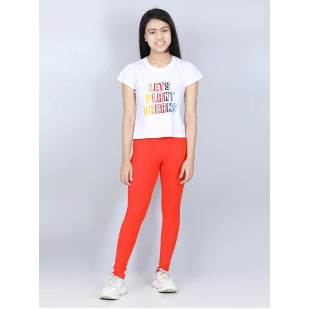 Orange cotton lycra elasticated jeggings for girls, solid pattern
