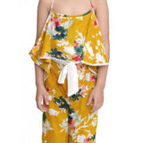 Mustard rayon floral shoulder straps jumpsuit for girls, square neck and vibrant floral pattern