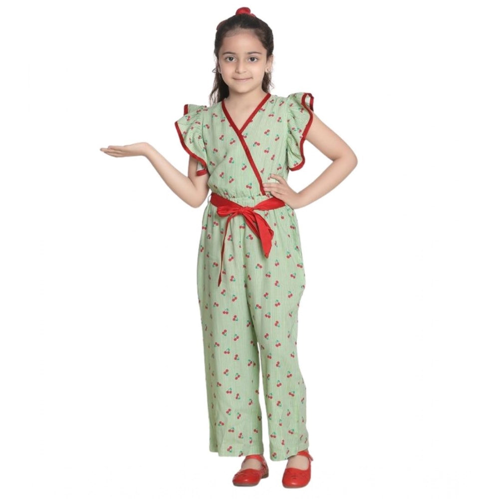 Green rayon printed flutter jumpsuit for girls, vibrant pattern detail on display