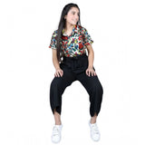 Multi-colored black polyester printed short sleeves jumpsuit for girls, vibrant pattern on display