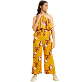Mustard polyester crepe floral sleeveless jumpsuit for girls - vibrant floral pattern, shoulder straps style