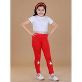 Red cotton lycra star print elasticated leggings for girls, activewear on model