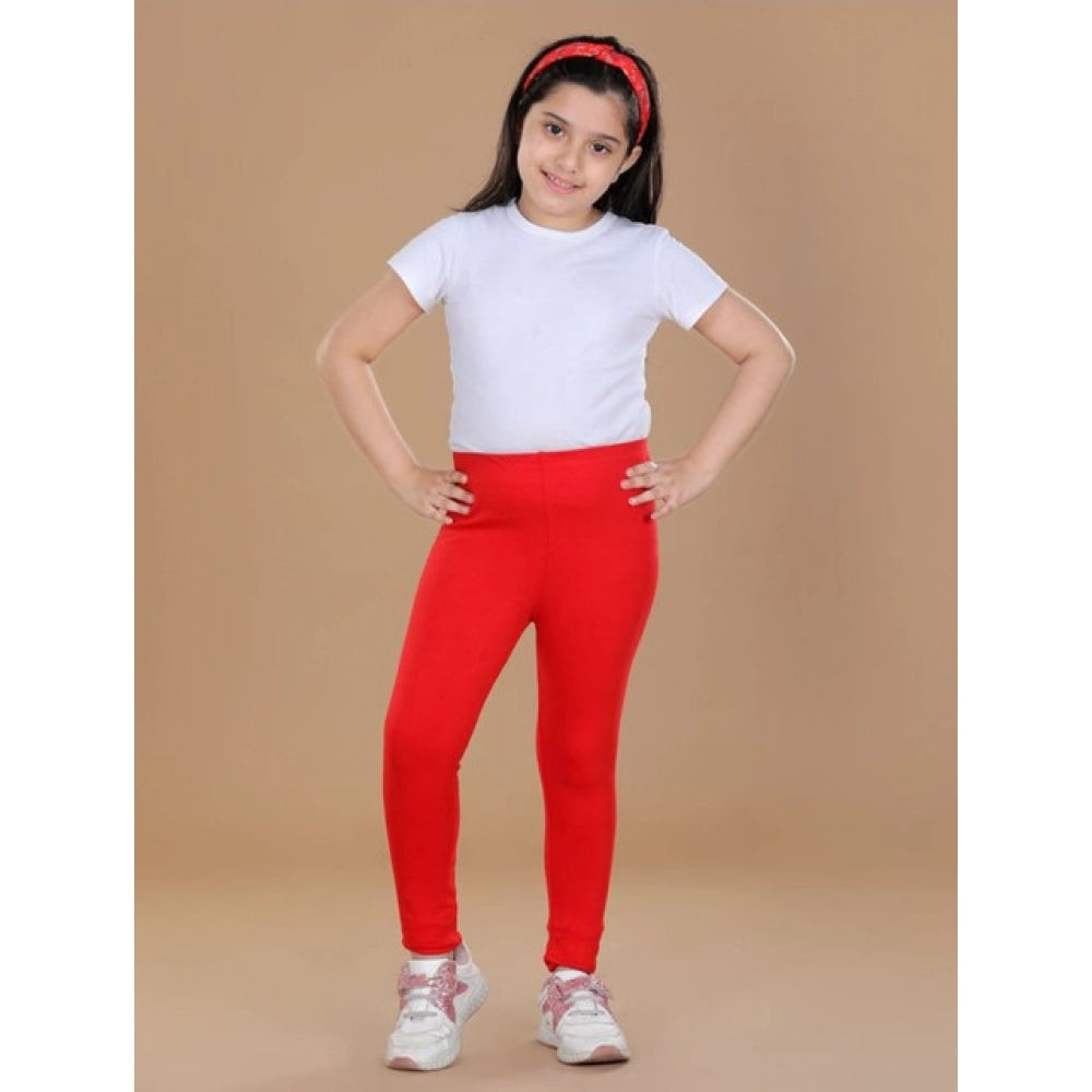 Red cotton lycra elasticated leggings for girls - solid pattern, comfortable athletic wear