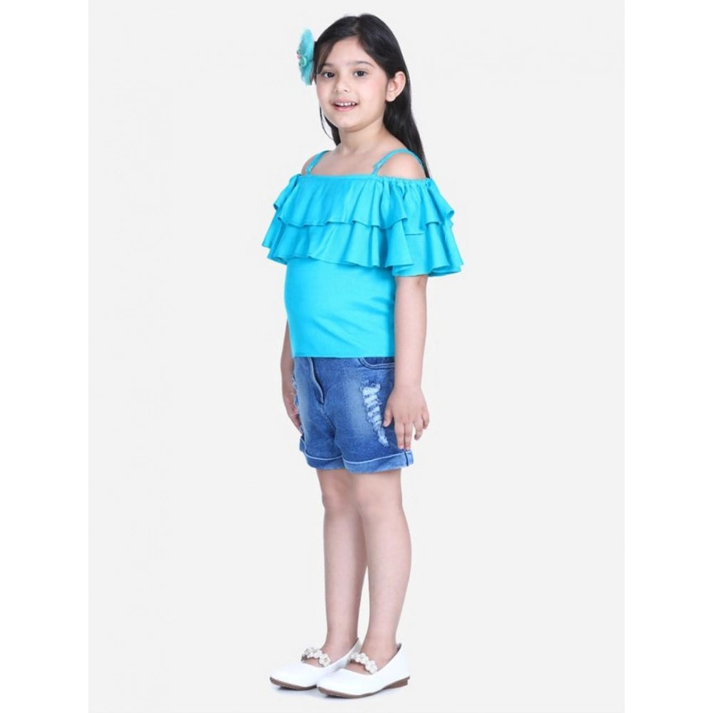 Blue rayon cold shoulder top with denim shorts - girl's solid style on display stand