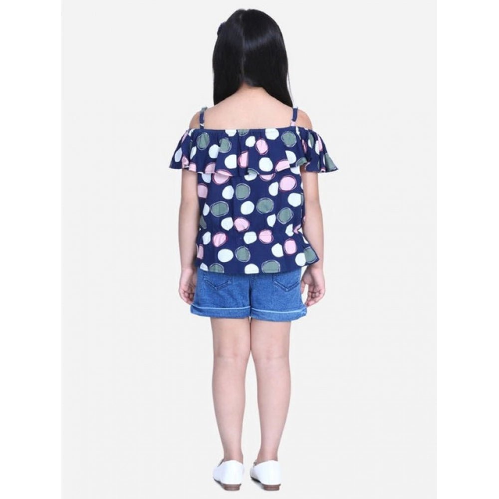 Navy Blue Rayon cold shoulder top with denim shorts, solid pattern and square neckline on model