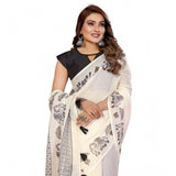 Off-white linen cotton printed saree with unstitched blouse, intricate design details visible on display stand