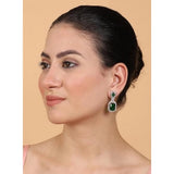 Green brass silver plated drop earrings, delicate jewelry for women's accessories, close-up on display