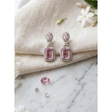 Women's pink brass silver plated drop earrings, jewelry accessory on white background