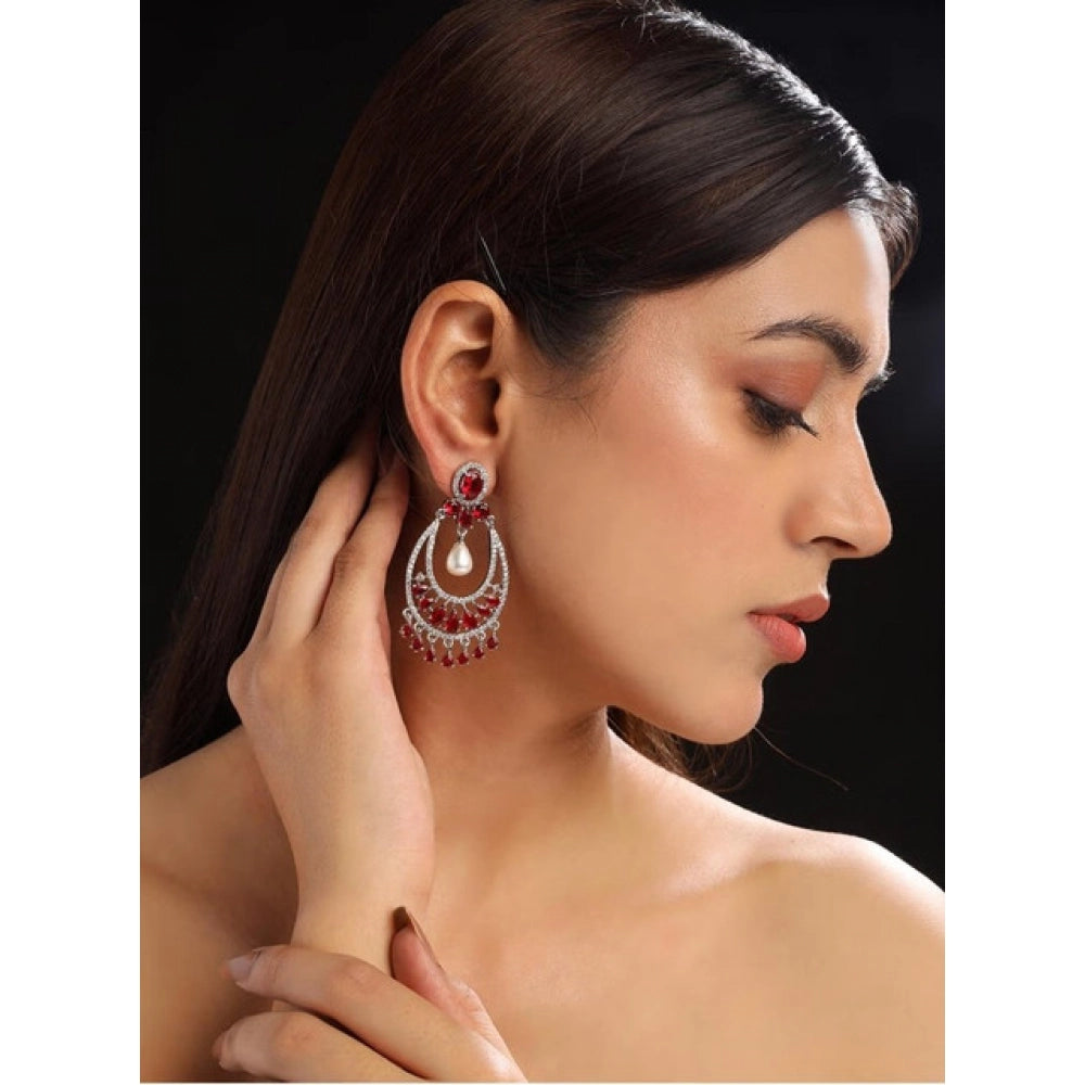 Women's red brass silver plated chandbali earrings on display, Indian jewelry accessories