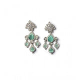 Women's brass silver plated turquoise drop earrings, stylish jewelry accessory on display